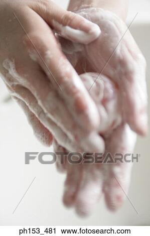 Close-up of a person washing hands View Large Photo Image Stock Image - Close-up of a person washing hands. Fotosearch