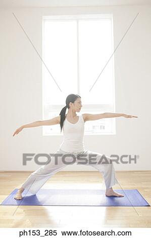 Young woman exercising View Large Photo Image Stock Photography - Young woman exercising. Fotosearch