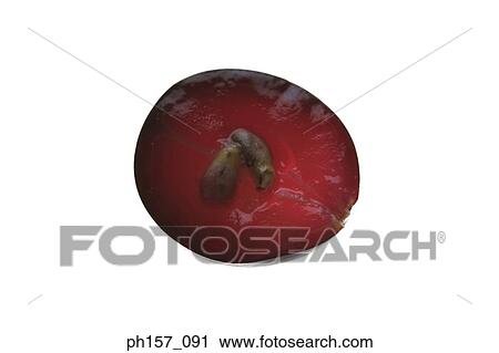 Stock Image - A single grape, halved. Fotosearch