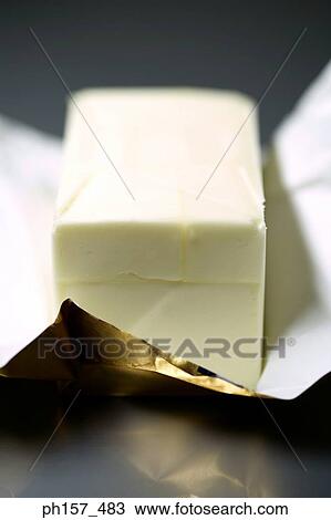 Stock Image - Butter, unwrapped. Fotosearch