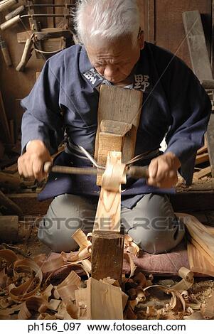 Carpenter working in a workshop View Large Photo Image Stock Photo - Carpenter working in a workshop. Fotosearch