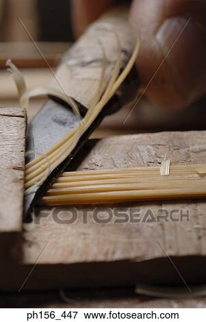 Carpenter's hand shaving wood View Large Photo Image Stock Photo - Carpenter's hand shaving wood. Fotosearch