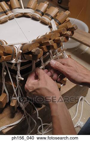 Close-up of a carpenter's hand making a samisen View Large Photo Image Stock Image - Close-up of a carpenter's hand making a samisen. Fotosearch