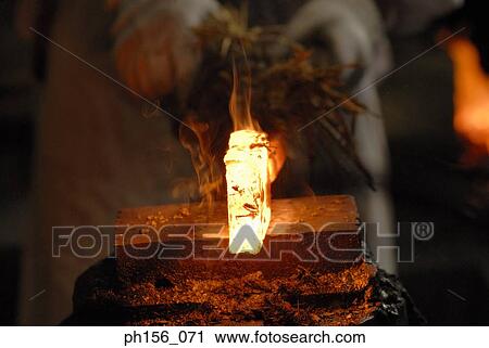 Close-up of a heated iron rod on an anvil View Large Photo Image Stock Image - Close-up of a heated iron rod on an anvil. Fotosearch