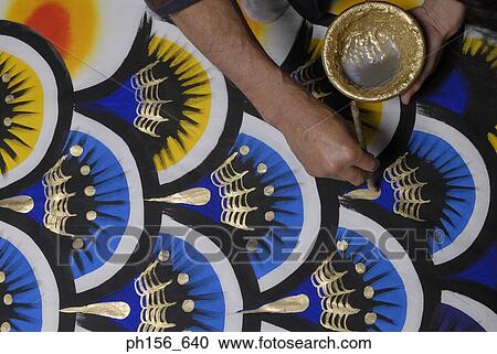 Close-up of a painter's hand painting View Large Photo Image Stock Image - Close-up of a painter's hand painting. Fotosearch