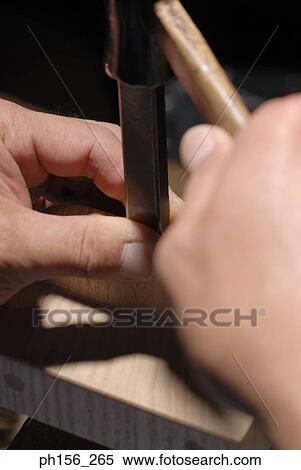 Close-up of a person working View Large Photo Image Stock Photography - Close-up of a person working. Fotosearch