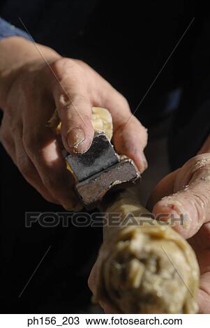 Close-up of a person's hand shaping a candle View Large Photo Image Stock Image - Close-up of a person's hand shaping a candle. Fotosearch