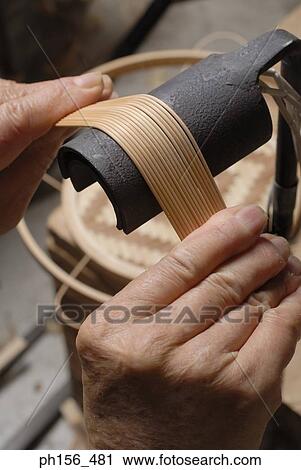 Close-up of a person's hand shaping bamboo sticks View Large Photo Image Stock Image - Close-up of a person's hand shaping bamboo sticks. Fotosearch