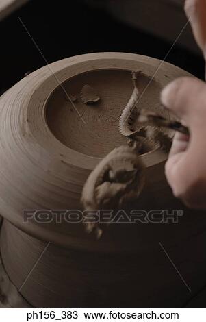 Close-up of a potter's hands making a vase on a pottery wheel View Large Photo Image Stock Image - Close-up of a potter's hands making a vase on a pottery wheel. Fotosearch
