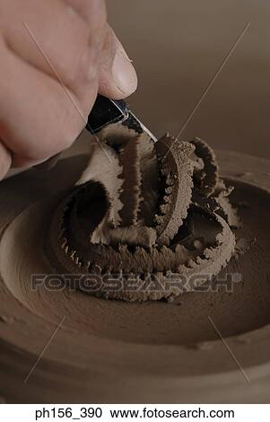 Close-up of a potter's hands making a vase on a pottery wheel View Large Photo Image Stock Image - Close-up of a potter's hands making a vase on a pottery wheel. Fotosearch