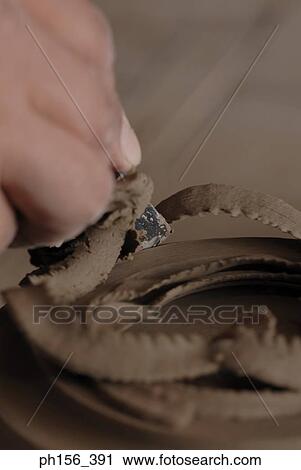 Close-up of a potter's hands making a vase on a pottery wheel View Large Photo Image Stock Image - Close-up of a potter's hands making a vase on a pottery wheel. Fotosearch