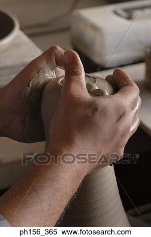 Close-up of a potter's hands making pottery View Large Photo Image Stock Photography - Close-up of a potter's hands making pottery. Fotosearch