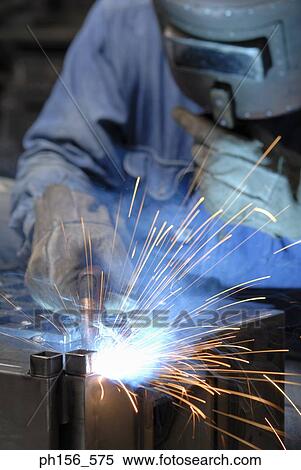 Close-up of a welder welding View Large Photo Image Stock Photography - Close-up of a welder welding. Fotosearch