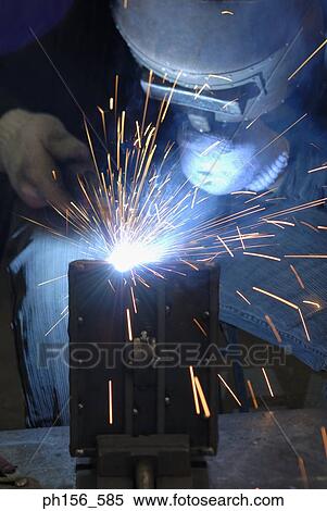 Close-up of a welder welding View Large Photo Image Stock Photography - Close-up of a welder welding. Fotosearch