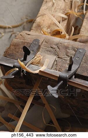 Close-up of a wooden plank with wood shavings around it View Large Photo Image Stock Image - Close-up of a wooden plank with wood shavings around it. Fotosearch