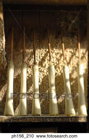 Close-up of candles on a shelf View Large Photo Image Stock Image - Close-up of candles on a shelf. Fotosearch