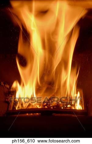 Close-up of fire in a furnace View Large Photo Image Stock Image - Close-up of fire in a furnace. Fotosearch