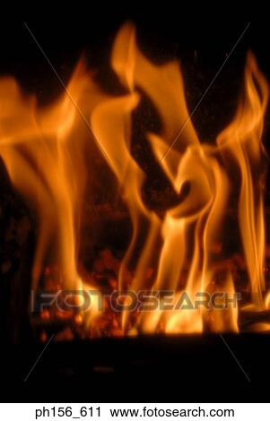 Close-up of fire in a furnace View Large Photo Image Stock Image - Close-up of fire in a furnace. Fotosearch