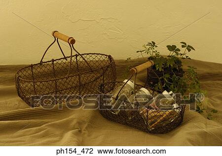 Close-up of jars of spices in a basket View Large Photo Image Stock Image - Close-up of jars of spices in a basket. Fotosearch