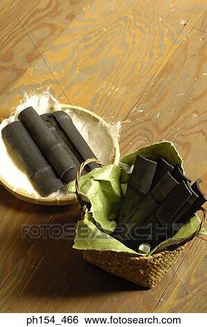 Stock Photograph - Close-up of pieces of bamboo in two wicker baskets. Fotosearch