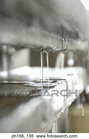 Close-up of wax dripping on a platform View Large Photo Image Stock Photography - Close-up of wax dripping on a platform. Fotosearch