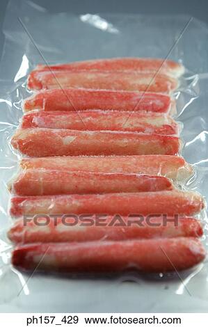 Crab sticks in plastic cover View Large Photo Image Stock Photo - Crab sticks in plastic cover. Fotosearch