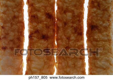 Stock Photography - Four Japanese fish cake, close-up. Fotosearch