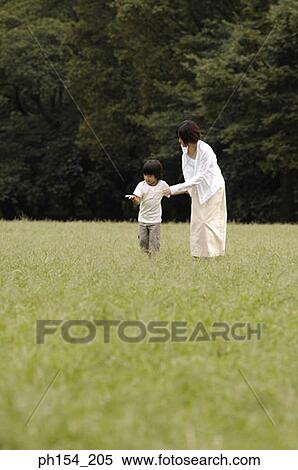 Girl showing her hand to her mother View Large Photo Image Stock Photography - Girl showing her hand to her mother. Fotosearch