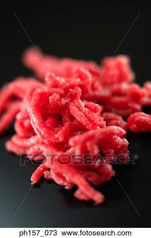Ground meat on black surface View Large Photo Image Stock Image - Ground meat on black surface. Fotosearch