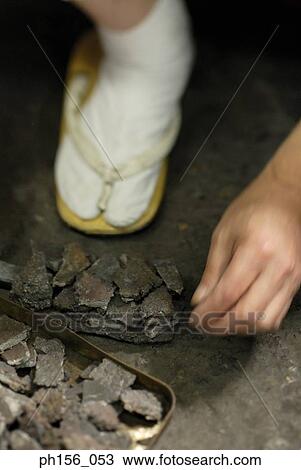 High angle view of a blacksmith's hand collecting metal scraps View Large Photo Image Stock Image - High angle view of a blacksmith's hand collecting metal scraps. Fotosearch