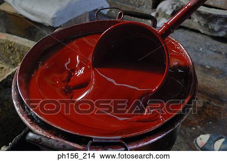Ladle in a paint can View Large Photo Image Picture - Ladle in a paint can. Fotosearch