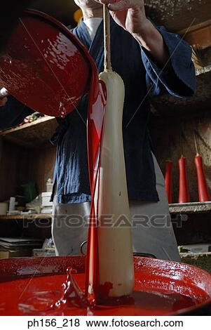 Mid section view of a person pouring paint on a candle View Large Photo Image Stock Photo - Mid section view of a person pouring paint on a candle. Fotosearch