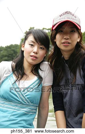 Portrait of two young women View Large Photo Image Stock Image - Portrait of two young women. Fotosearch