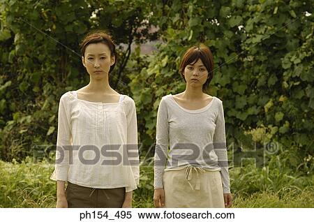 Portrait of two young women View Large Photo Image Stock Photography - Portrait of two young women. Fotosearch