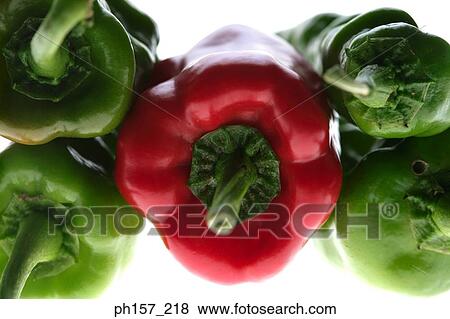 Red bell pepper and green chilli pepper, close-up View Large Photo Image Stock Photo - Red bell pepper and green chilli pepper, close-up. Fotosearch