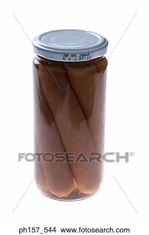 Picture - Sausages in a glass container. Fotosearch