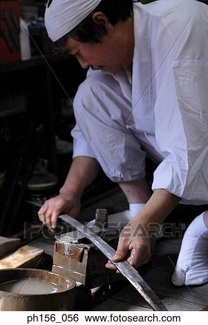 Side profile of a blacksmith sharpening a sword View Large Photo Image Stock Photograph - Side profile of a blacksmith sharpening a sword. Fotosearch