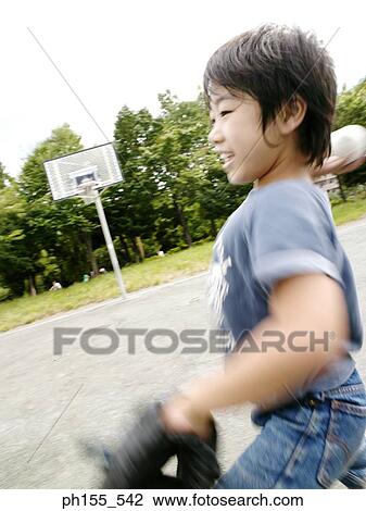 Side profile of a boy throwing a baseball View Large Photo Image Stock Image - Side profile of a boy throwing a baseball. Fotosearch