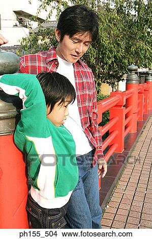Side profile of a father with his son View Large Photo Image Picture - Side profile of a father with his son. Fotosearch