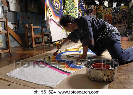 Side profile of a painter painting View Large Photo Image Picture - Side profile of a painter painting. Fotosearch