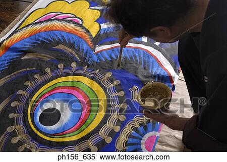 Side profile of a painter painting View Large Photo Image Stock Photography - Side profile of a painter painting. Fotosearch