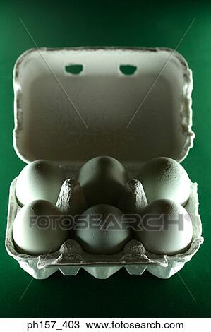 Six eggs in an egg crate View Large Photo Image Stock Image - Six eggs in an egg crate. Fotosearch