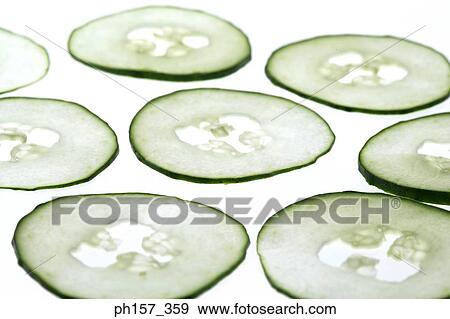 Slices of cucumber View Large Photo Image Stock Photo - Slices of cucumber. Fotosearch