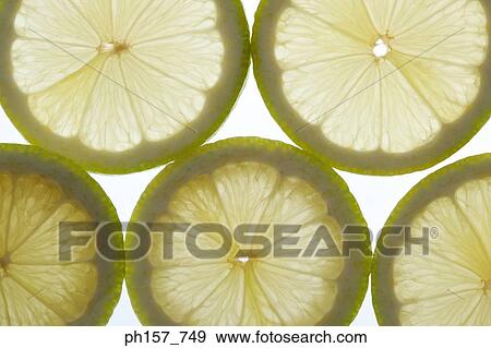 Slices of lemon View Large Photo Image Stock Photo - Slices of lemon. Fotosearch