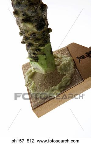 Stock Image - Wasabi root with tough, brownish-green skin,. Fotosearch