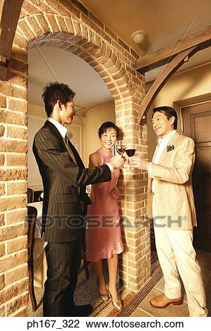 A group of friends toasting with wine View Large Photo Image Stock Image - A group of friends toasting with wine. Fotosearch