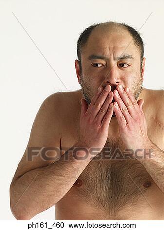 Bare chested mature man, with hands on mouth, close-up View Large Photo Image Stock Image - Bare chested mature man, with hands on mouth, close-up. Fotosearch