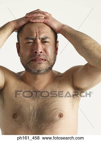 Bare-chested mature man with hands on his head View Large Photo Image Stock Photo - Bare-chested mature man with hands on his head. Fotosearch