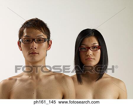 Stock Photography - Bespectacled couple, front view. Fotosearch