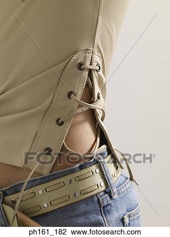 Close-up of a man with a shirt and jeans, side view View Large Photo Image Stock Image - Close-up of a man with a shirt and jeans, side view. Fotosearch